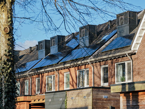Modern row houses with integrated heat pumps on the roof in Assen, Netherland, showcasing Dutch Architecture and sustainability