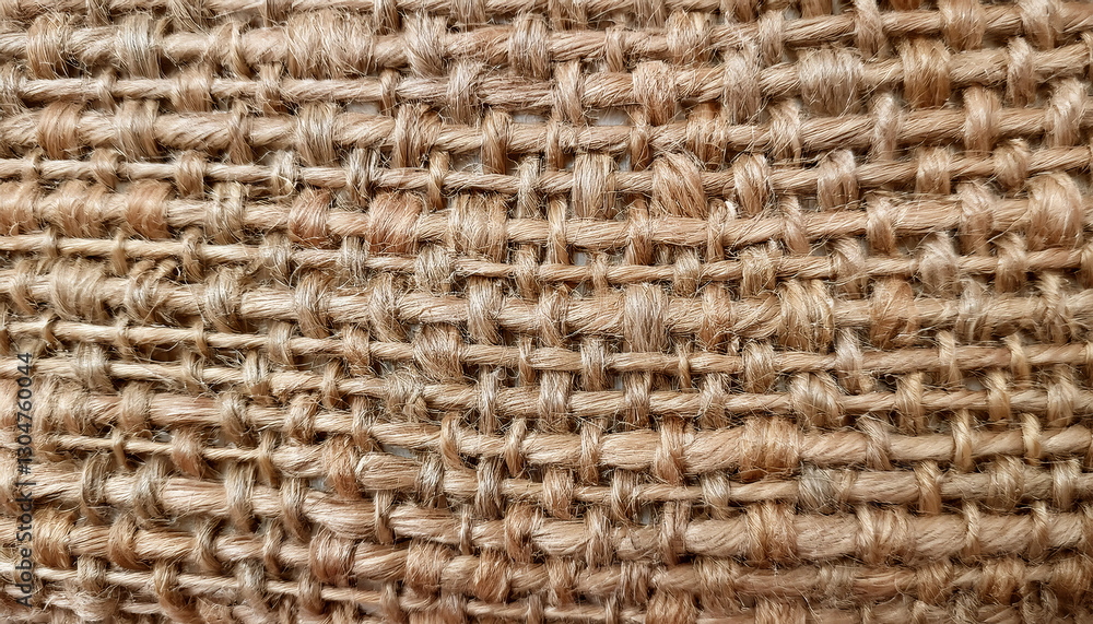 A high-resolution view of woven burlap fabric showcasing its organic patterns, texture, and craftsmanship. Suitable for backgrounds, textures, or crafting projects. A high-resolution view of woven burlap fabric showcasing its organic patterns, texture, and craftsmanship. Suitable for backgrounds, textures, or crafting projects.