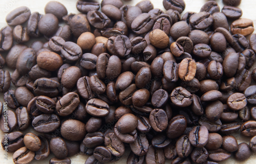 Fototapeta premium Coffee beans, roasted coffee beans scattered