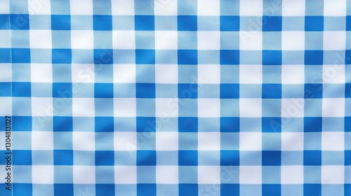 A vibrant blue and white gingham pattern fabric, featuring a classic checkered design that adds a cheerful touch to any setting.