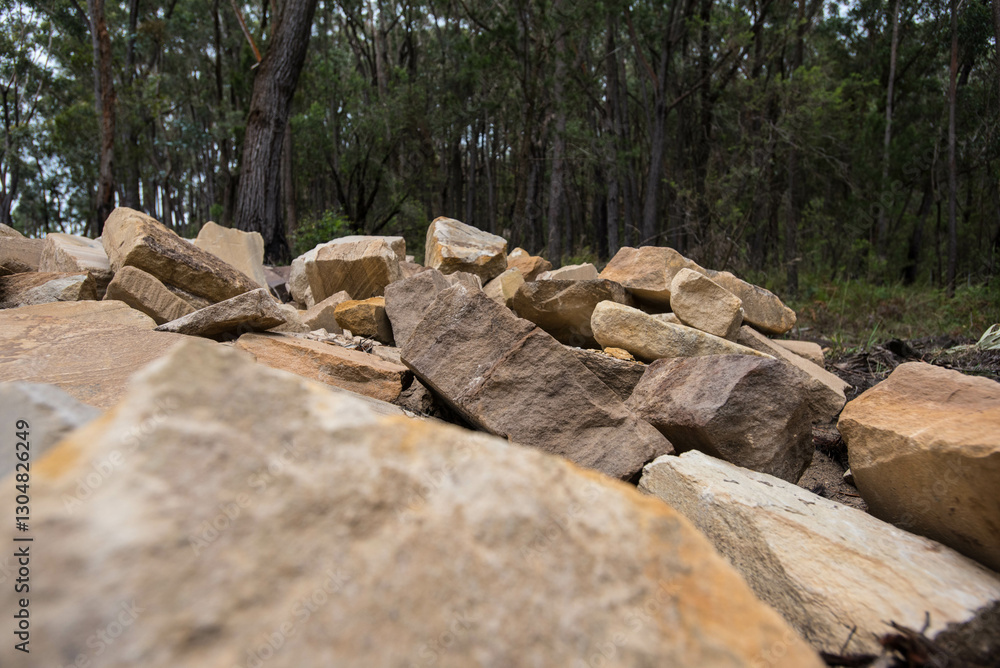 Sandstone blocks with trees in background Sandstone blocks with trees in background