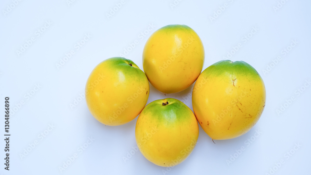 Close up of abiu fruit (golden fruit) isolated on white background, selective focus. Clipping path included. Close up of abiu fruit (golden fruit) isolated on white background, selective focus. Clipping path included.
