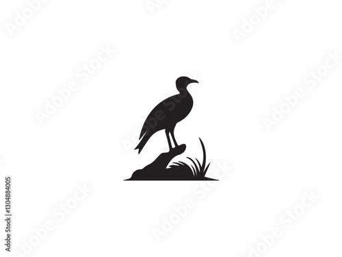 silhouette of a bird.Silhouette of a bird perched on a grassy bank.A simple, elegant silhouette of a bird, likely a wading bird, perched atop a small, grassy mound.