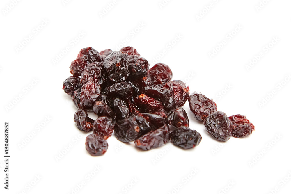 A scattered pile of dried cranberries with glossy textures, wrinkled surfaces, and deep red tones, isolated on a white background A scattered pile of dried cranberries with glossy textures, wrinkled surfaces, and deep red tones, isolated on a white background