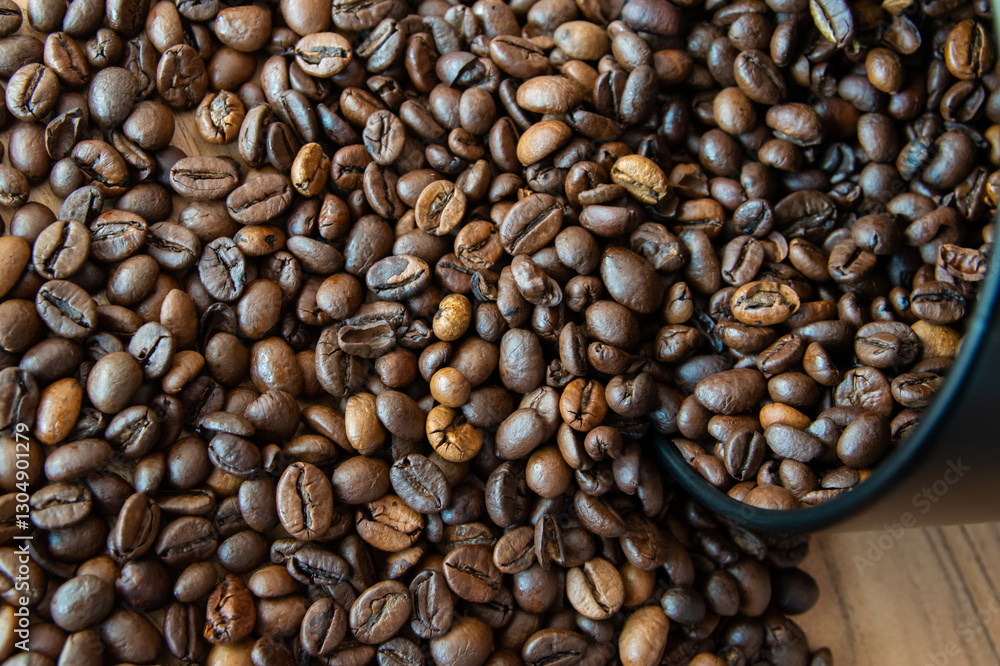 Box with coffe on the roasted coffe beans. Box with coffe on the roasted coffe beans.