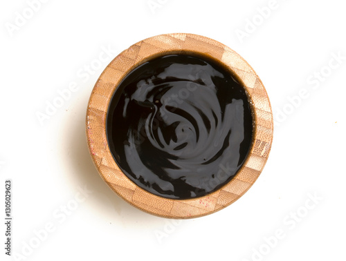bowl with teriyaki sauce on white background