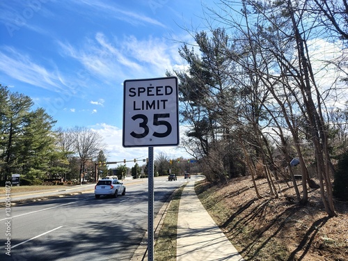 Washington, DC, USA - 03. 03. 2025: 35 mph speed limit sign on a rural unoccupied road, attention and information signs for drivers on roads in the USA