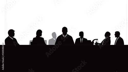 The image is a monochrome silhouette depicting a group of individuals seated at a long table.  The figures are rendered in solid black against a stark white background featuring subtle
