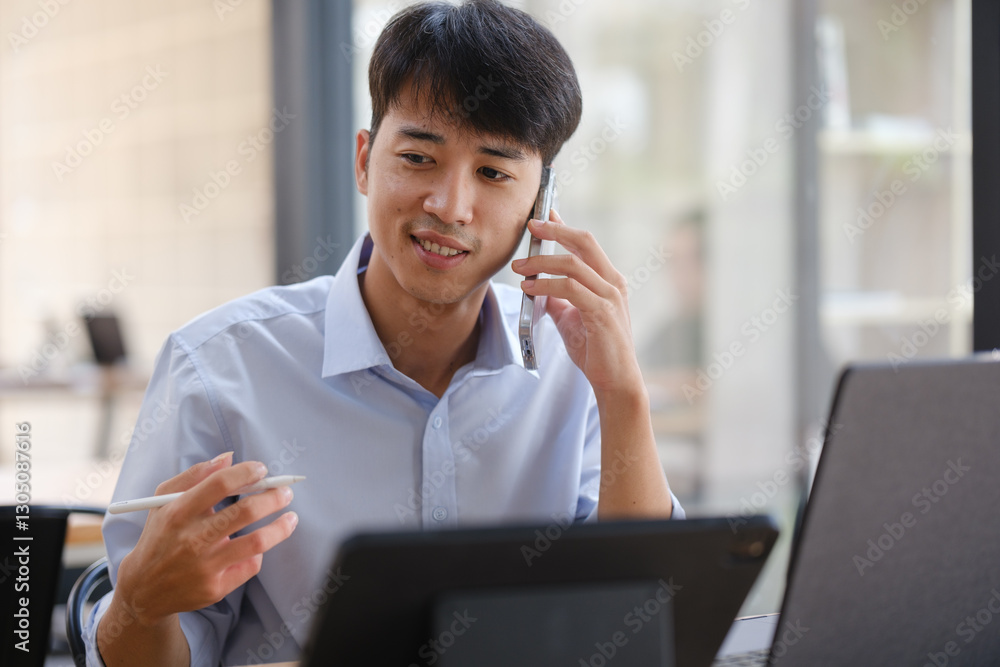 Business consultant discussing financial strategies on a phone call Business consultant discussing financial strategies on a phone call