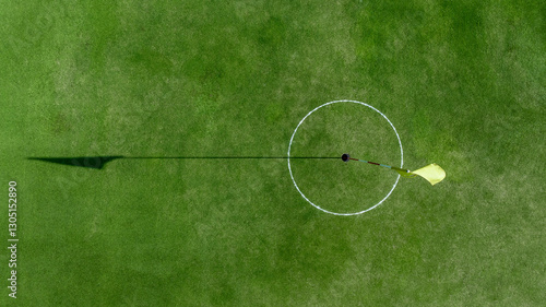 Top view putting green with flag at golf course, Golf Course with putting green, Golf course sport, green grass on golf field, fairway and putting green top view.