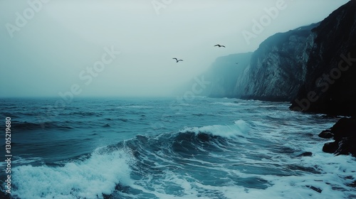 Foggy Coastline With Waves Crashing Against Cliffs During Early Morning Hours