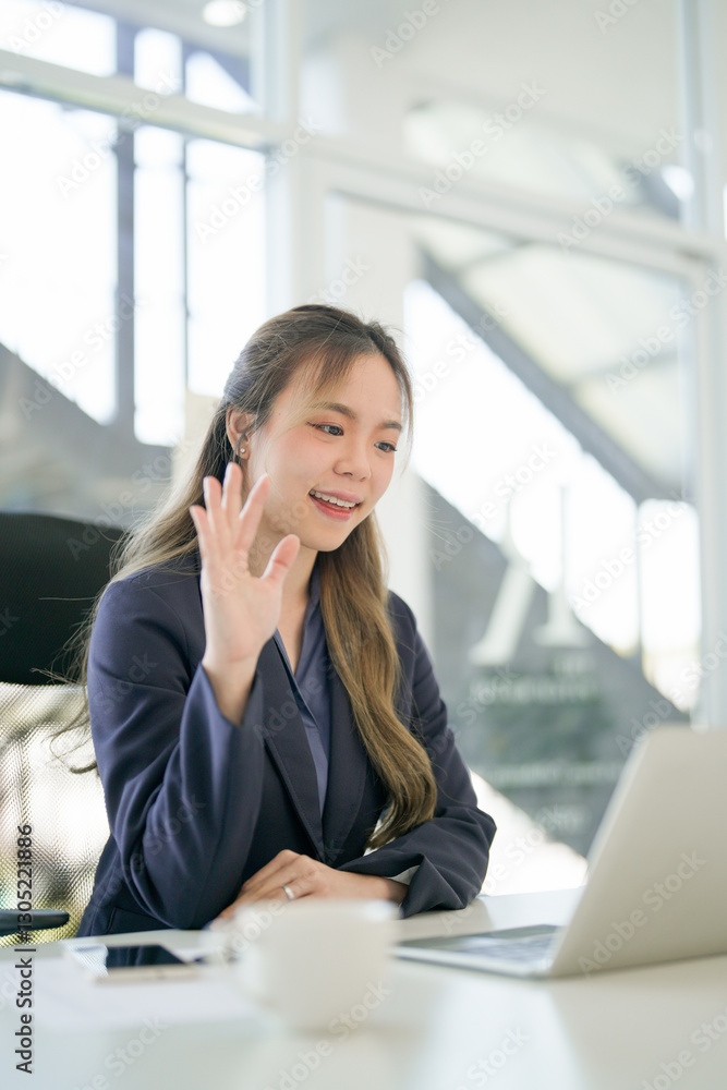 Portrait of confident Asian business woman working in office Portrait of confident Asian business woman working in office