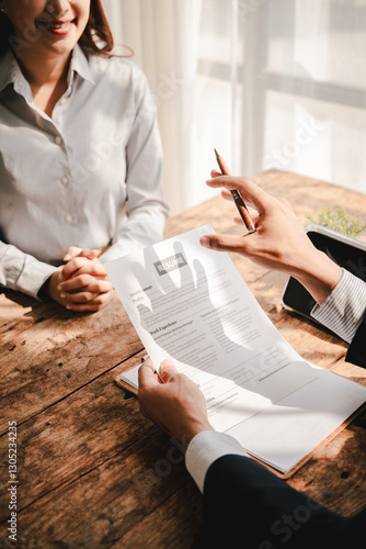 Portrait of a person interviewing for a job and.Submit resume to staff job application concept