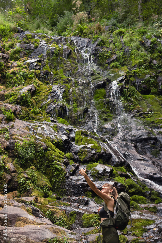 Woman Tourist Taking Selfie Picture by Waterfall