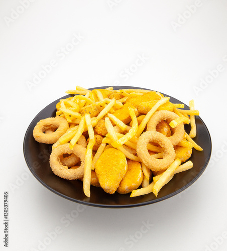 French fries, onion rings, nuggets, snacks, appetizers, hors d'oeuvre plate, black plate