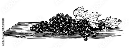 Engraved illustration of grapes on wooden surface with leaves showcasing the beauty of natural produce