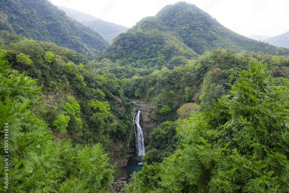 Peaceful waterfall in Taiwan mountain forest view