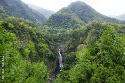 Obraz na płótnie Peaceful waterfall in Taiwan mountain forest view w salonie