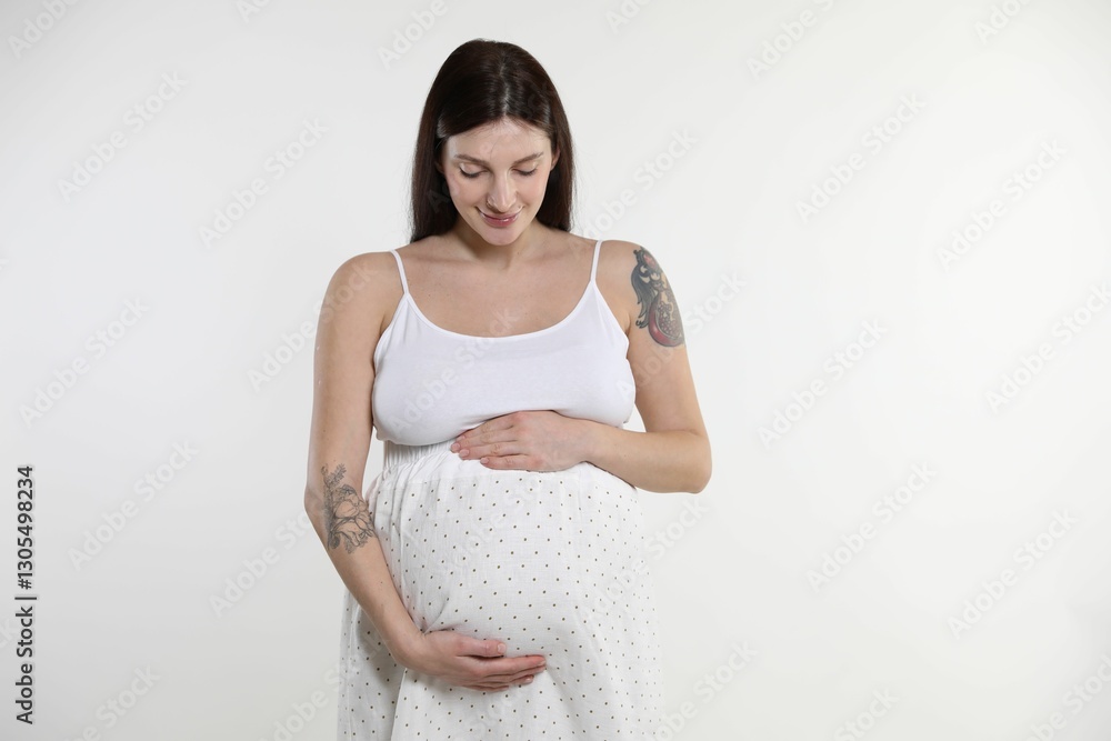 Beautiful pregnant woman with cute belly on white background Beautiful pregnant woman with cute belly on white background