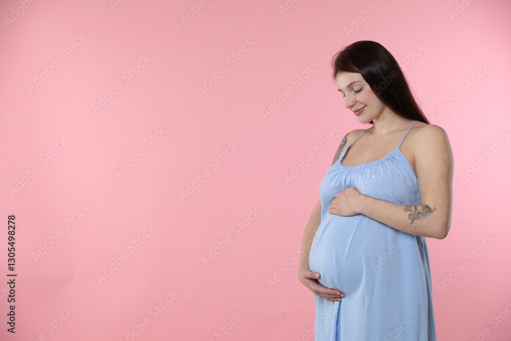 Beautiful pregnant woman with cute belly on pink background. Space for text Beautiful pregnant woman with cute belly on pink background. Space for text