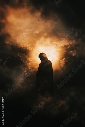 Powerful silhouette of Jesus against dramatic, stormy sky with rays of light breaking through the clouds. Deep contrast, epic and emotional mood. Good Friday concept with copy space.