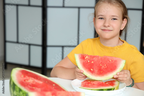 Happy little girl with slic...