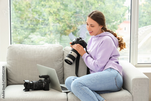 Female photographer with ca...