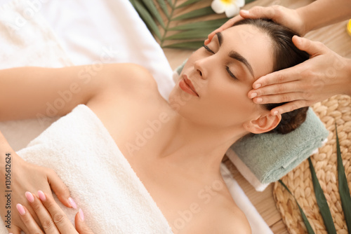 Young woman getting massage...