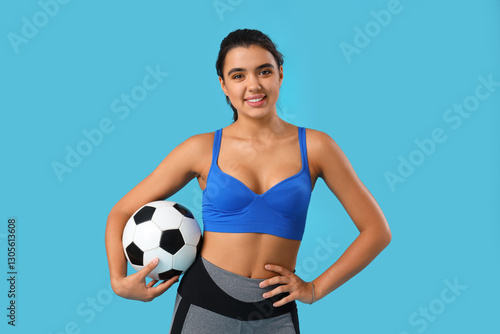 Sporty young woman with soc...