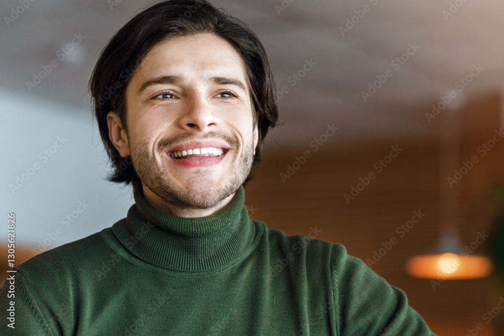 Obraz premium Excited blogger full of creative ideas working online at cafe, holding digital tablet, drinking coffee or tea, copy space