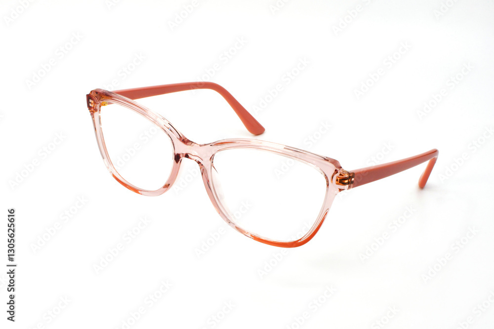 Pair of women's glasses with transparent pink frames isolated on a plain white background. Eye health concept. Copy space. Pair of women's glasses with transparent pink frames isolated on a plain white background. Eye health concept. Copy space.