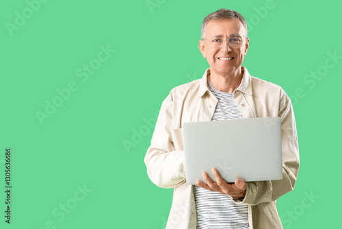 Mature man in eyeglasses us...