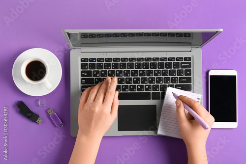 Female hands working on lap...