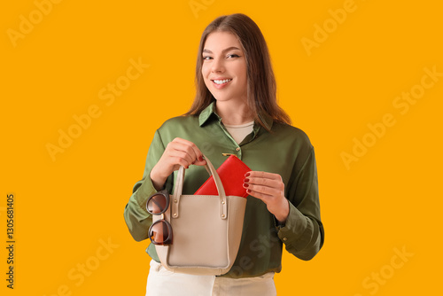 Young woman with purse in h...