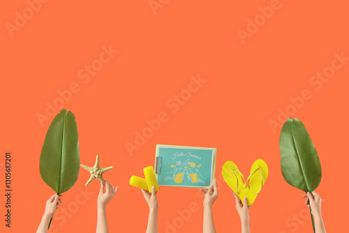 Female hands with beach acc...
