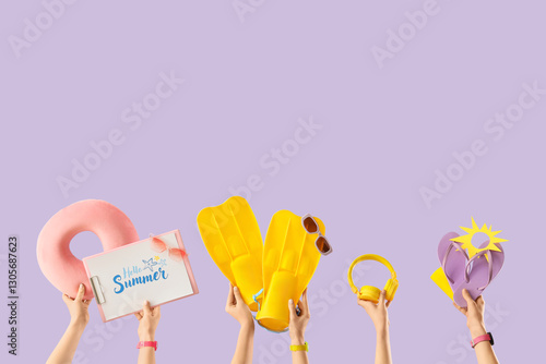 Female hands with beach acc...