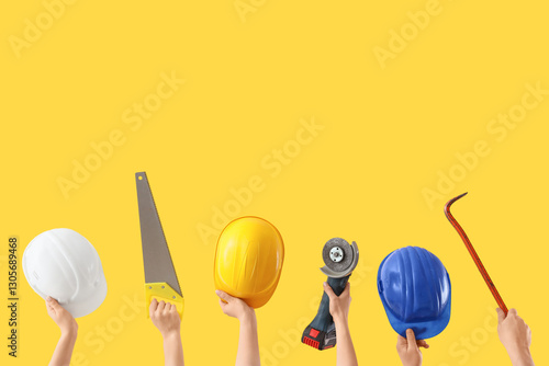 Many hands with constructio...
