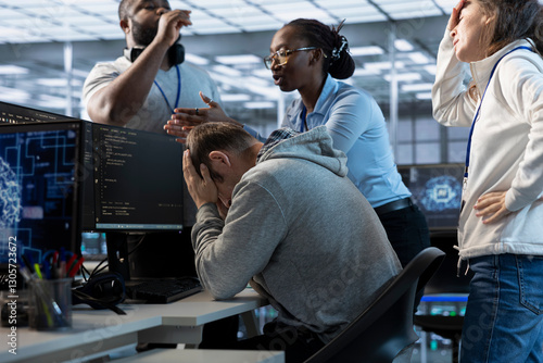 Принти на полотні Employees berating engineer in office after mistake leading to errors in high tech AI data center