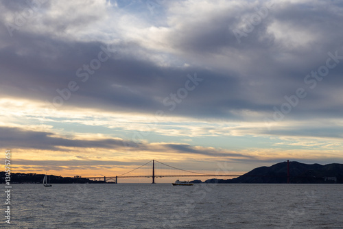 Scenic View of San Francisco Bay, Shell, Golden Gate Bridge, and Pier on a late afternoon