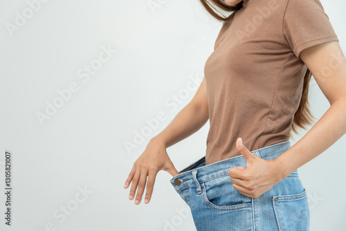 Fotografie Women showing results of diet