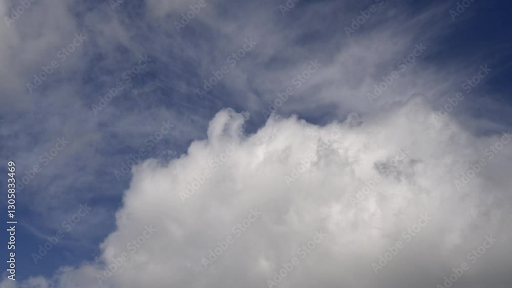 fast moving clouds in a deep blue sky fast moving clouds in a deep blue sky