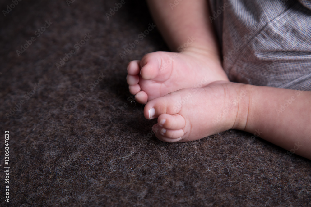 Little human newborn baby feet details close up Little human newborn baby feet details close up