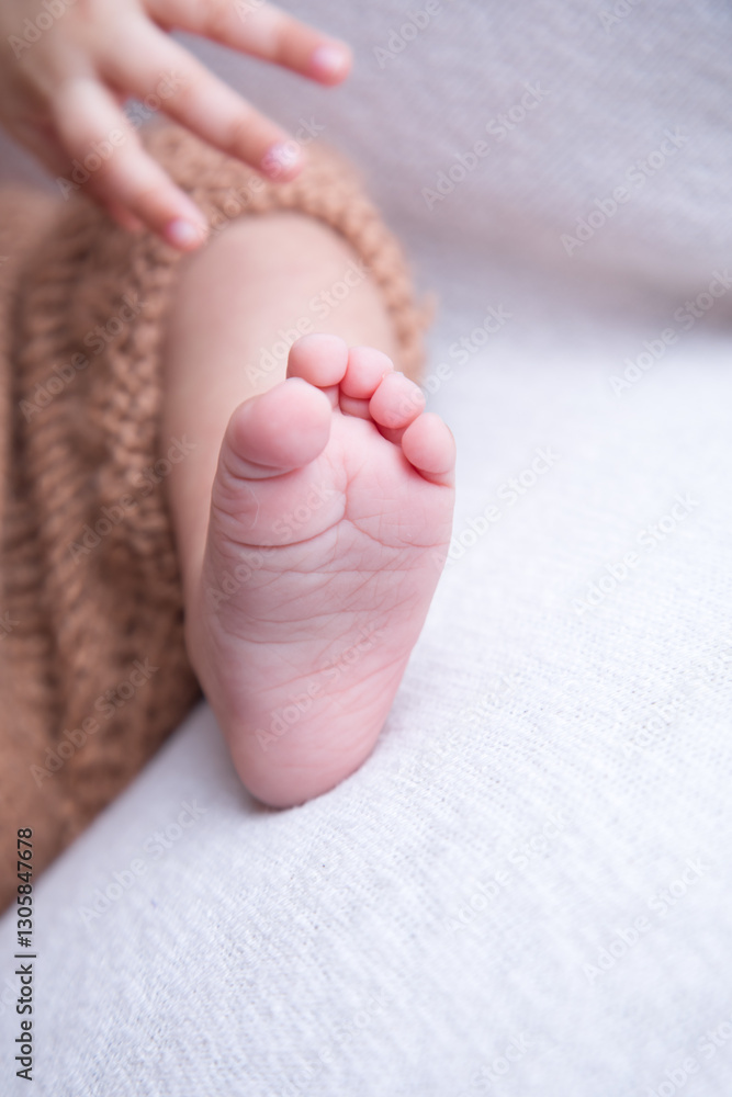 Little human newborn baby feet details close up Little human newborn baby feet details close up