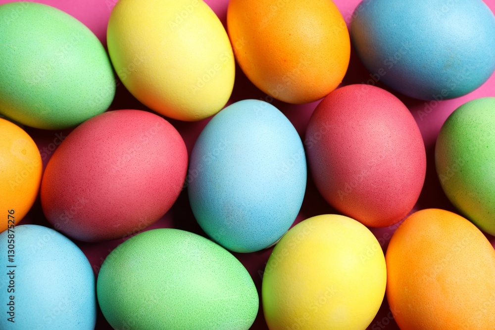 Beautiful decorated Easter eggs on pink background, flat lay Beautiful decorated Easter eggs on pink background, flat lay