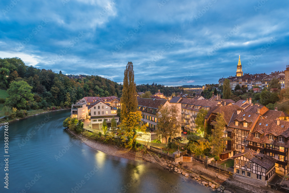 Bern (Berne) Switzerland night city skyline at old town and Aare River in autumn season
