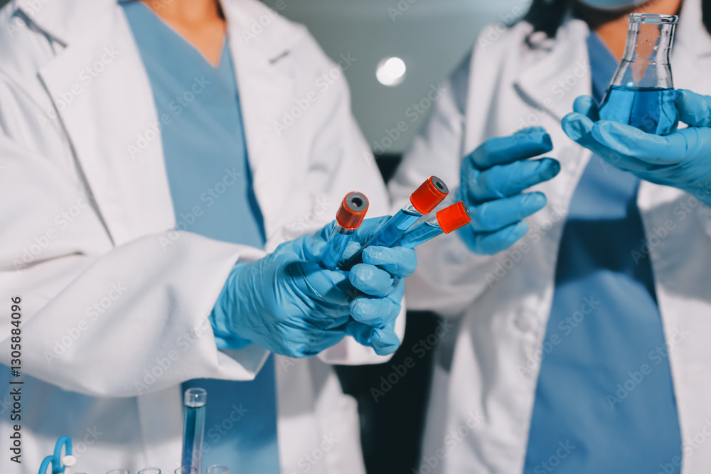 Researchers working in the clinical laboratory Researchers working in the clinical laboratory