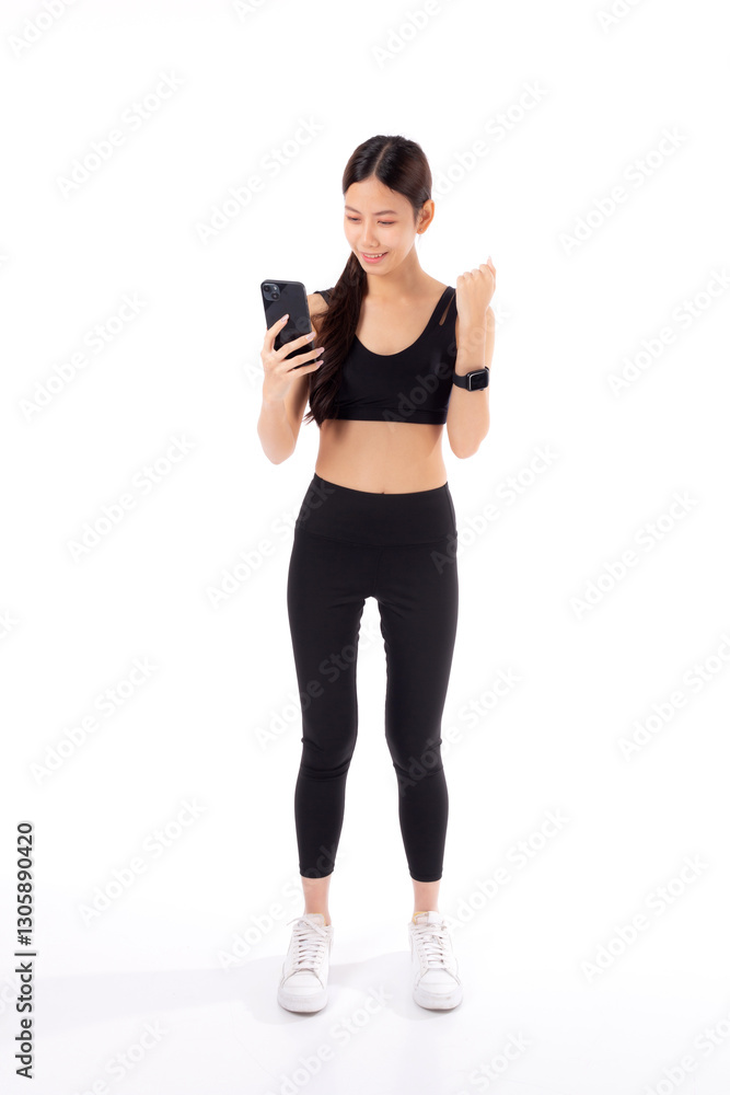 A fit young asian woman in sportswear using a smart phone, possibly managing her fitness routine isolated white background, active woman using smartphone in sportswear, sport and health. A fit young asian woman in sportswear using a smart phone, possibly managing her fitness routine isolated white background, active woman using smartphone in sportswear, sport and health.