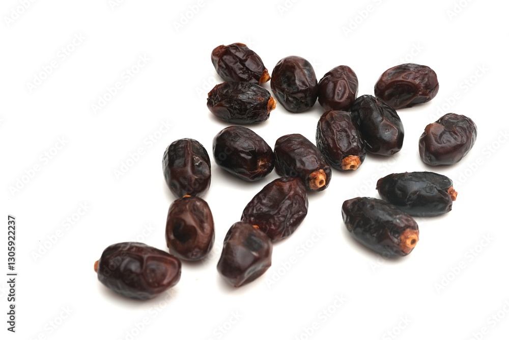 dried black dates isolated on white background dried black dates isolated on white background