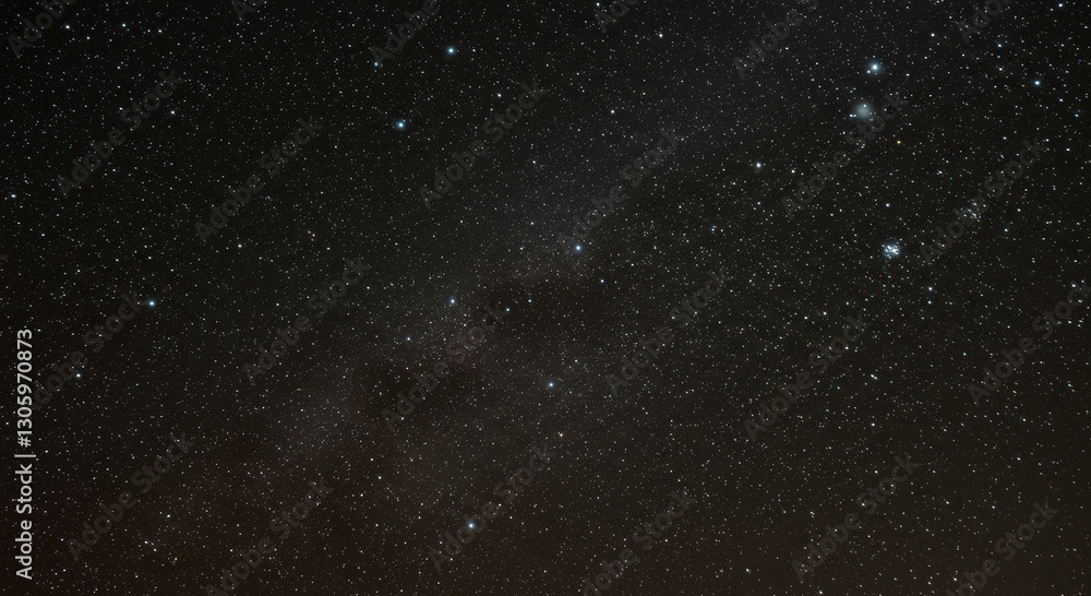 Obraz premium Celestial Tapestry: A breathtaking view of the night sky, with countless stars twinkling against a deep black canvas, the milky way stretches across the vast expanse, inspiring awe and wonder.
