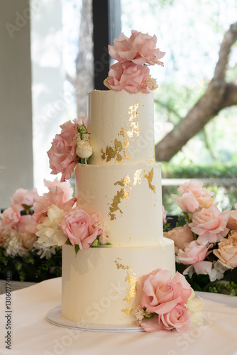 Wedding cake with gold leafing decoration